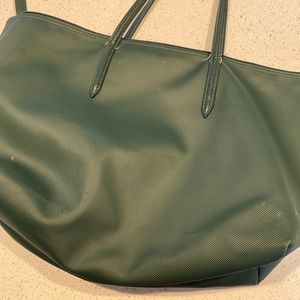 Lacoste handbag In good used condition see pictures one white mark on bag.